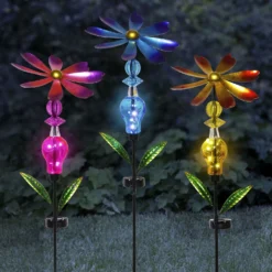 Bejeweled Metal Spinning Floral Solar Stake Light